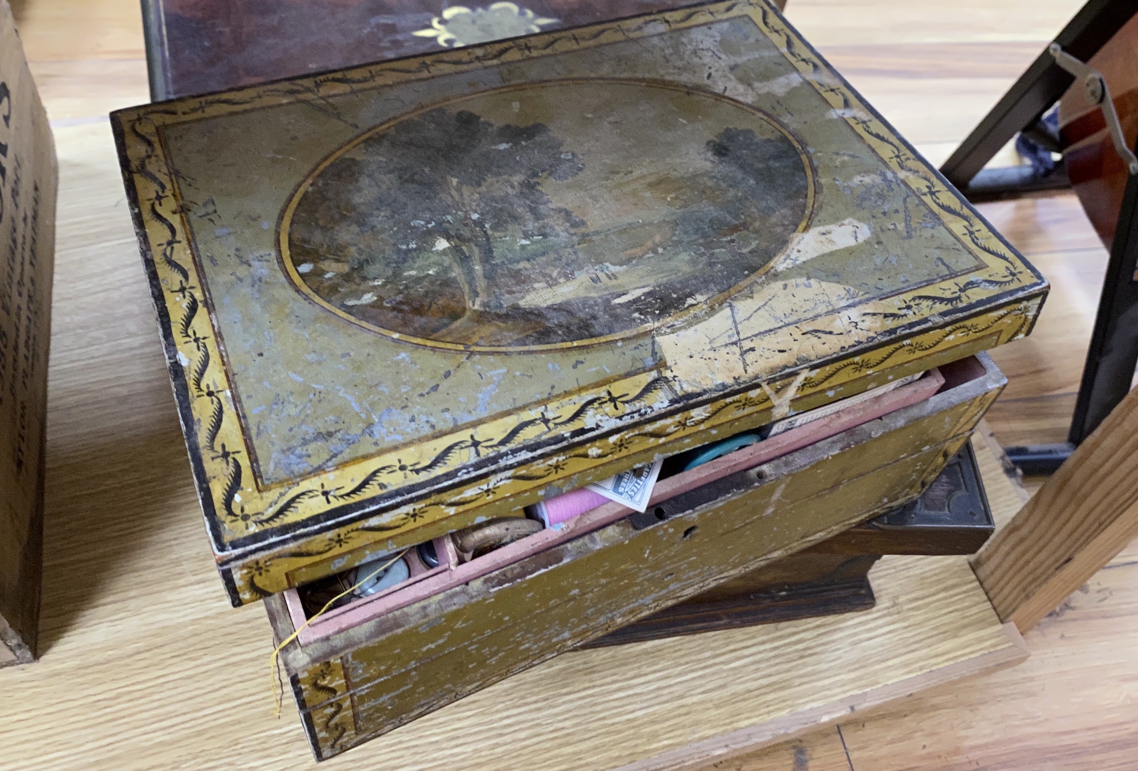 A George III mahogany and brass bound writing slope, a painted sewing box and an oak brass mounted sewing box, (3), writing slope 45cm wide x 26cm deep